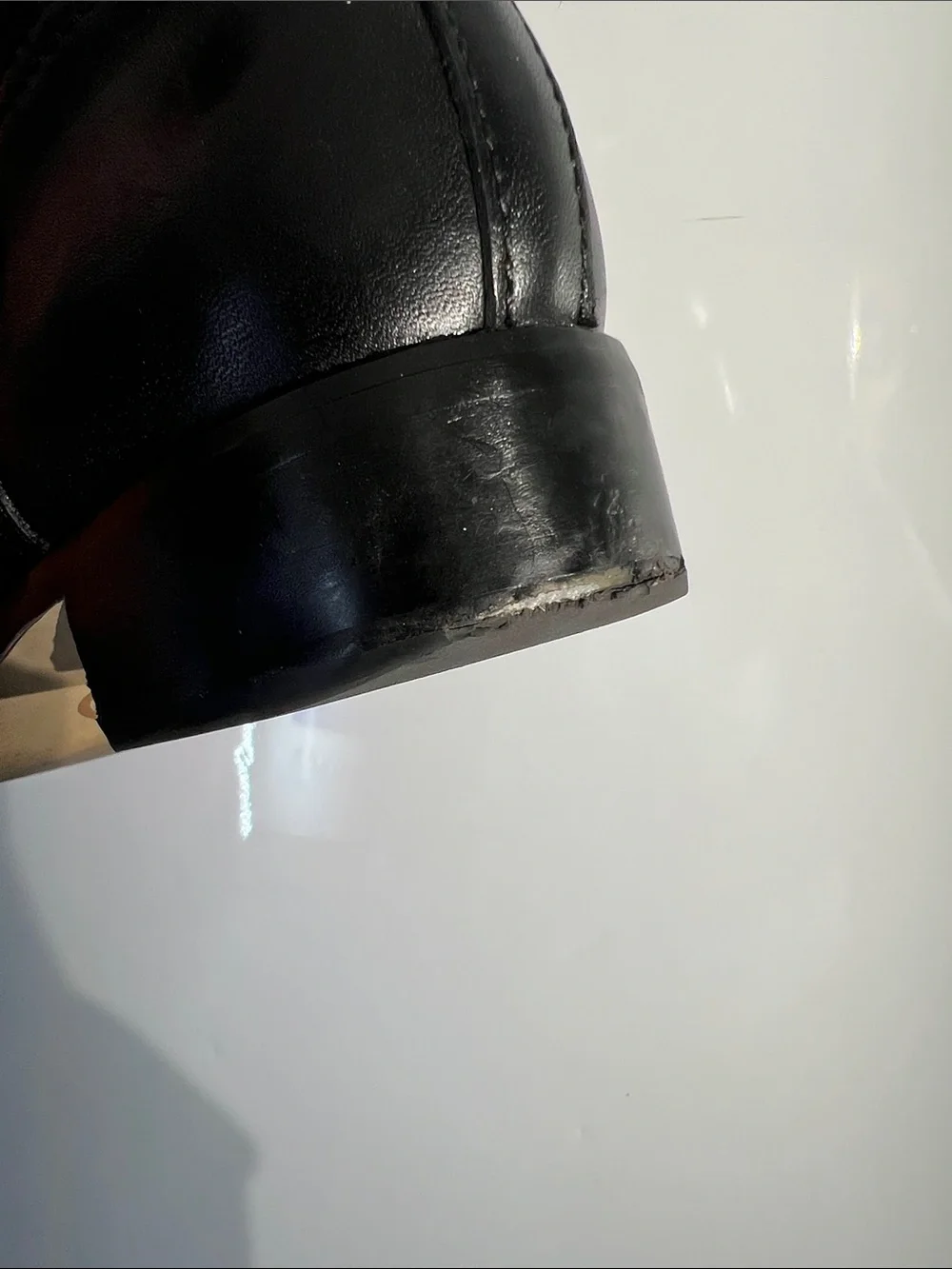 Knee-high leather boots with MK logo